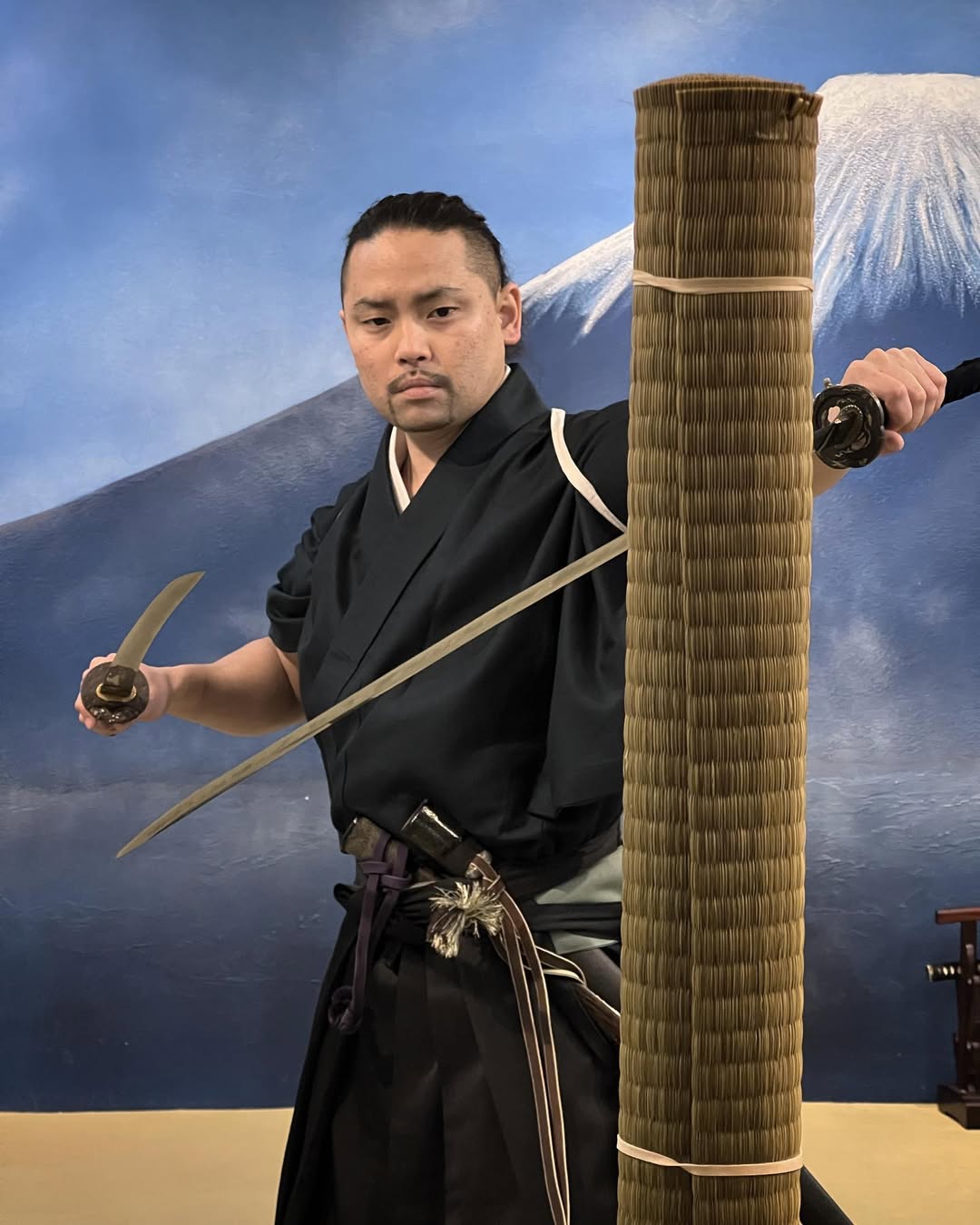 Two-sword nito stance — the technique developed by Miyamoto Musashi, still practiced at Yushinkan today