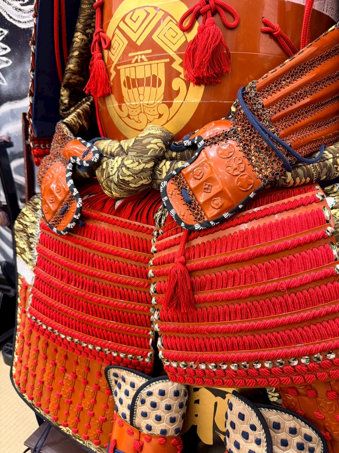 Samurai armor skirt (kusazuri) of red-laced hanging plates