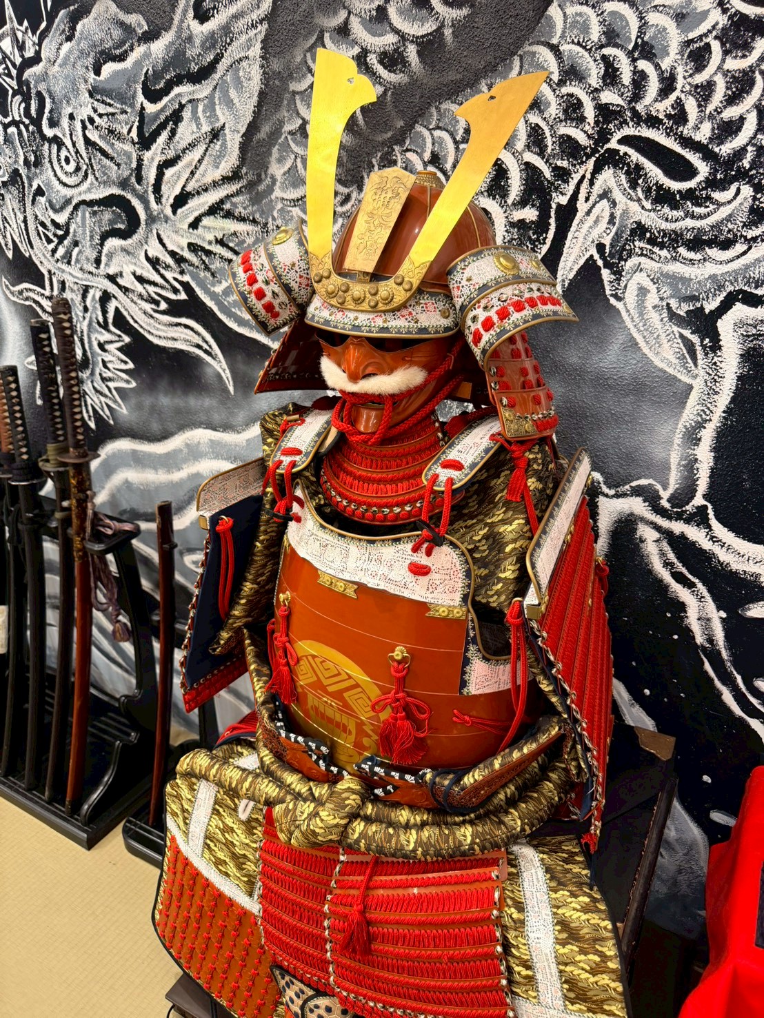 Samurai chest armor (do) with red lacing, three-quarter view